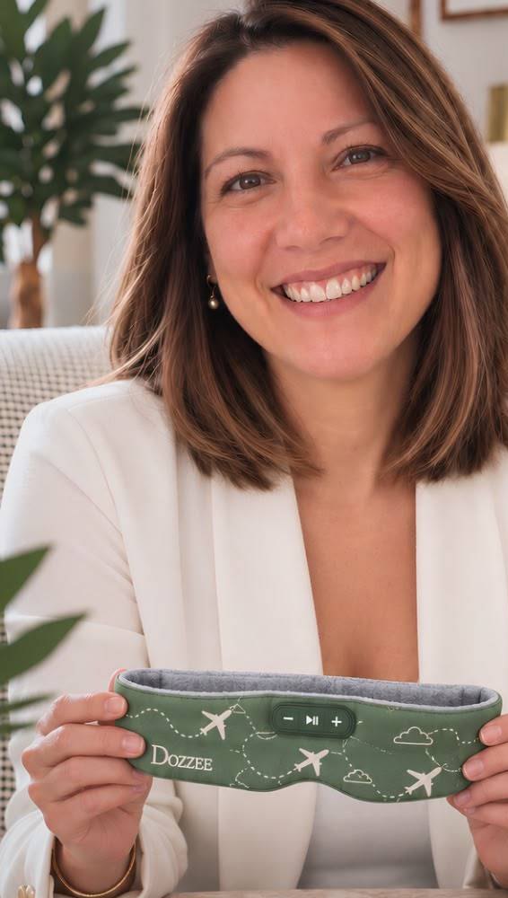 Aurora Nolasco, founder of Dozzee, holding a Dozzee band